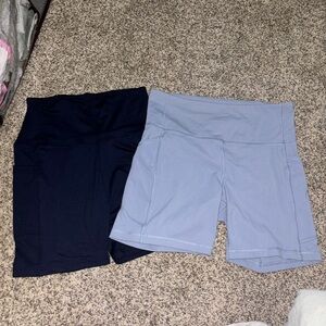 Pair of Biker Shorts - CRZ YOGA (sky blue) & Amazon Essentials (navy) S/M